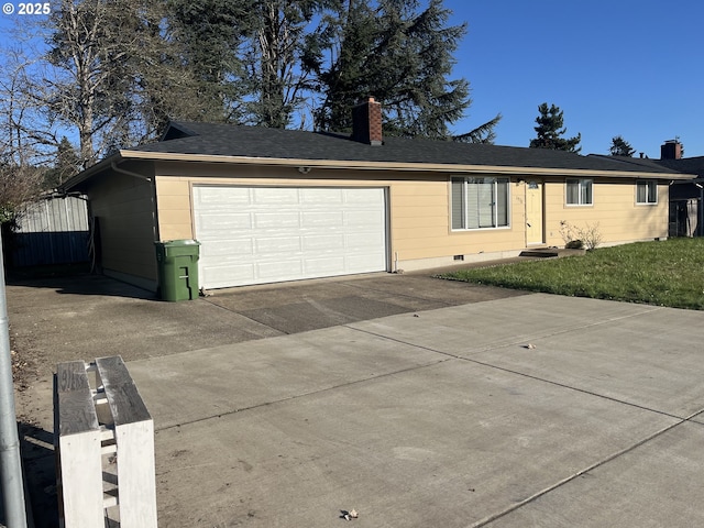 single story home featuring roof with shingles, a chimney, crawl space, a garage, and driveway