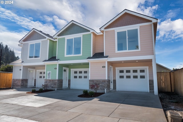 craftsman-style home featuring a garage