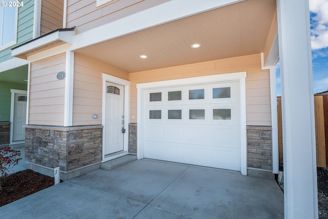 exterior space with a garage