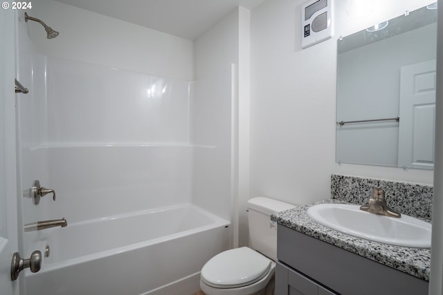 full bathroom with bathtub / shower combination, toilet, and vanity