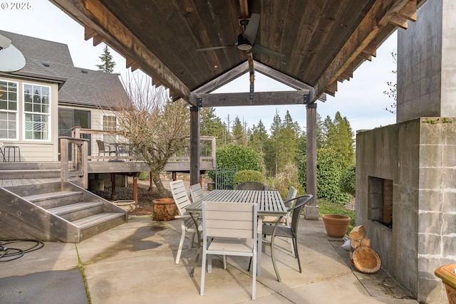 view of patio / terrace featuring a gazebo, a deck, and ceiling fan