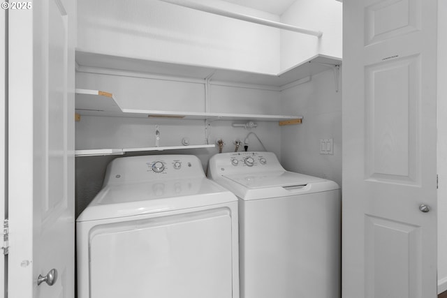 9455 SW 146th Ter Unit D 2, Beaverton, OR 97007 - clothes washing area featuring washing machine and clothes dryer