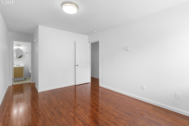 9455 SW 146th Ter Unit D 2, Beaverton, OR 97007 - unfurnished bedroom with wood finished floors, baseboards, and ensuite bath