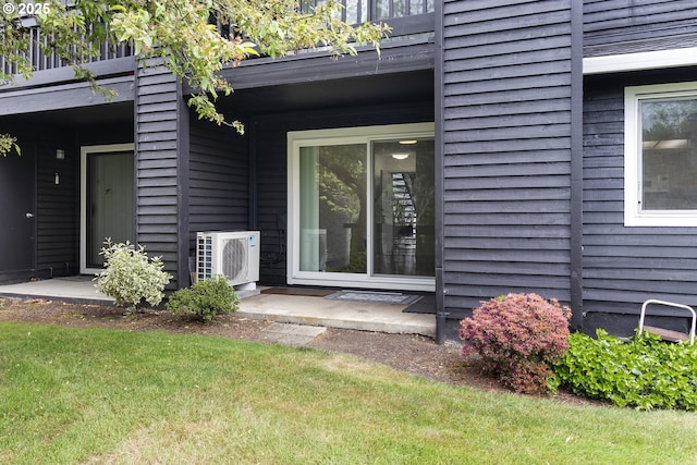 9455 SW 146th Ter Unit D 2, Beaverton, OR 97007 - entrance to property with ac unit, a balcony, and a yard
