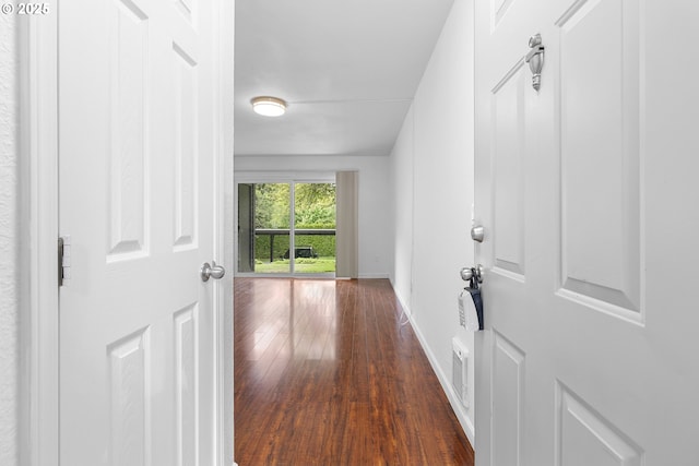 9455 SW 146th Ter Unit D 2, Beaverton, OR 97007 - hallway featuring dark wood-style floors and baseboards