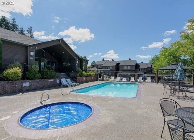 9455 SW 146th Ter Unit D 2, Beaverton, OR 97007 - community pool with a gazebo, a patio, and a community hot tub