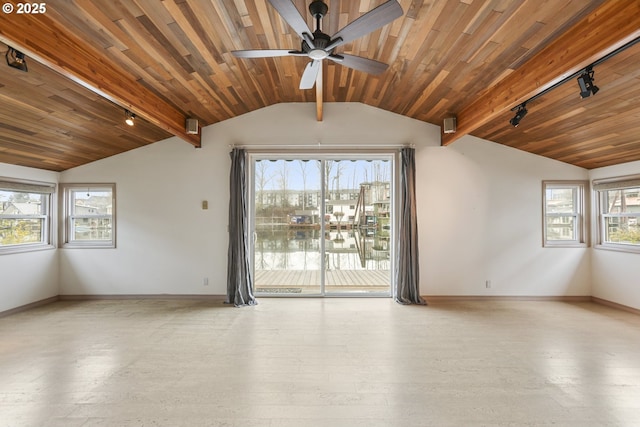 empty room featuring wood ceiling and light hardwood / wood-style flooring