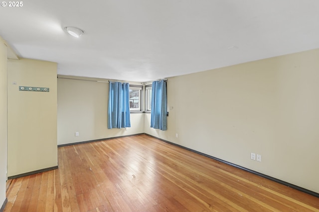 empty room featuring light hardwood / wood-style floors