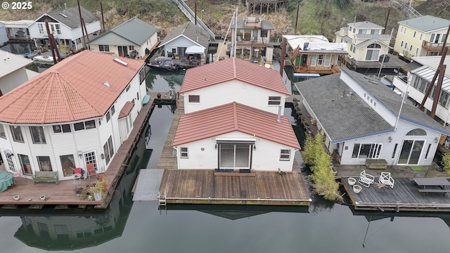 drone / aerial view with a water view