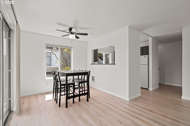 20910 Fawn Ct Unit 8, West Linn, OR 97068 - dining room featuring light wood-style floors and a ceiling fan