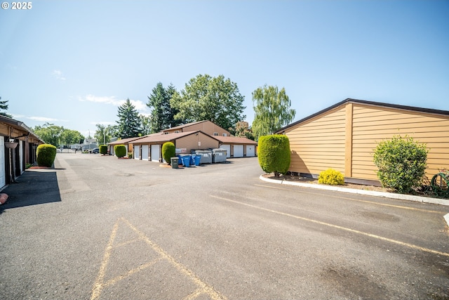 621 SE 121st Ave Unit 29, Vancouver, WA 98683 - view of street featuring community garages