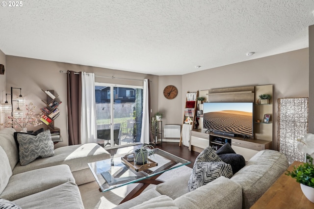 living room featuring dark wood-style floors, a ceiling fan, and baseboards