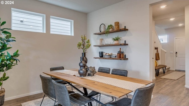 dining area with light hardwood / wood-style flooring