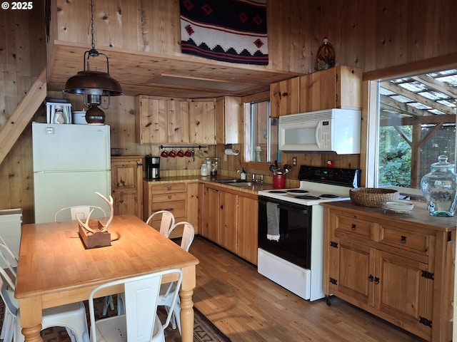747 N Tenmile, Lakeside, OR 97449 - kitchen featuring white appliances and light wood finished floors