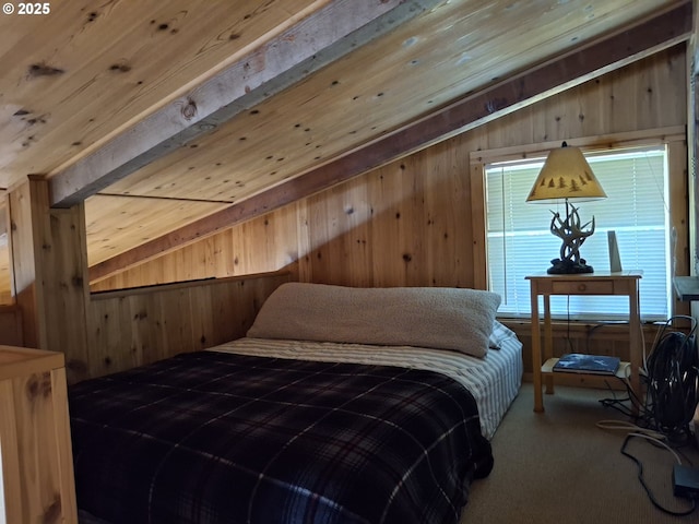 747 N Tenmile, Lakeside, OR 97449 - bedroom with wooden walls, beam ceiling, and carpet floors
