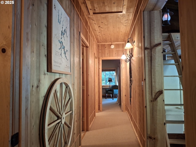 747 N Tenmile, Lakeside, OR 97449 - hall featuring wooden ceiling and carpet flooring