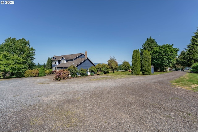 30174 SE Waybill Rd, Boring, OR 97009 - view of front facade featuring a chimney