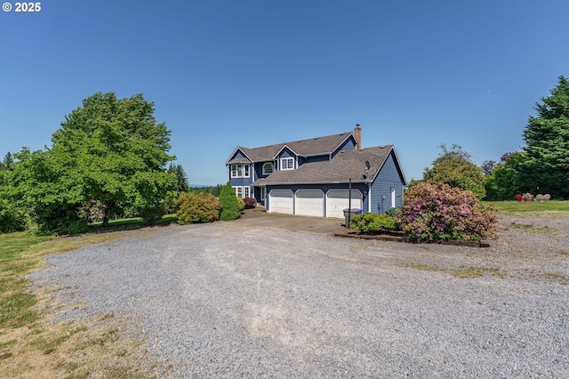 30174 SE Waybill Rd, Boring, OR 97009 - view of front of property with a chimney and driveway