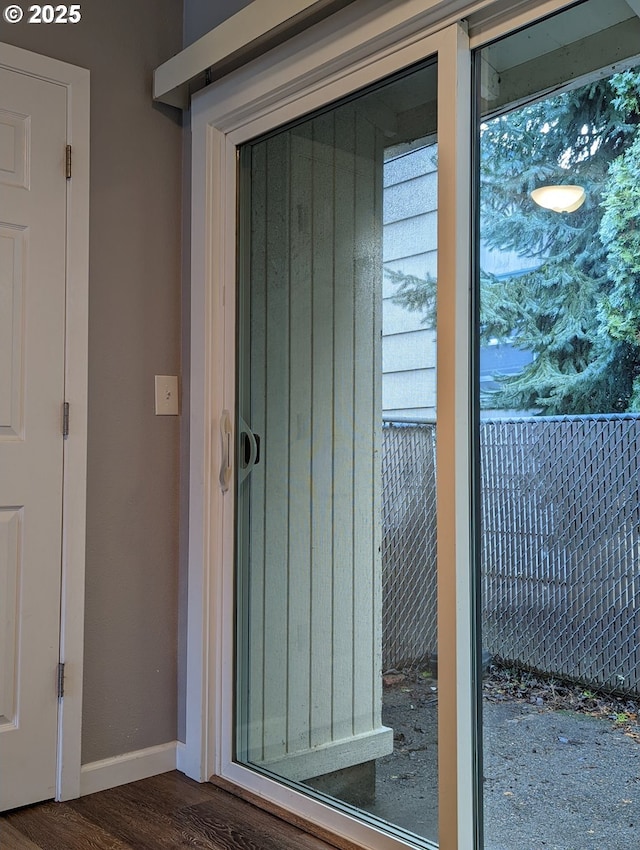 exterior space with dark wood-type flooring