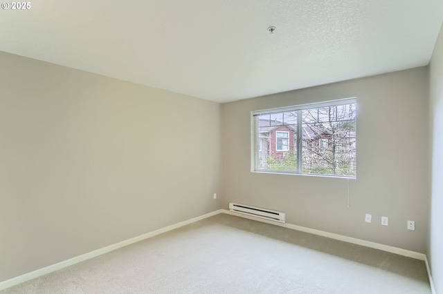 14700 SW Sandhill Loop Unit 204, Beaverton, OR 97007 - carpeted empty room with baseboard heating, baseboards, and a pendent fire sprinkler