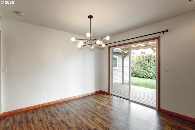 14075 SW Cherryhill Dr, Beaverton, OR 97008 - spare room with a chandelier, baseboards, dark wood-style floors, and visible vents