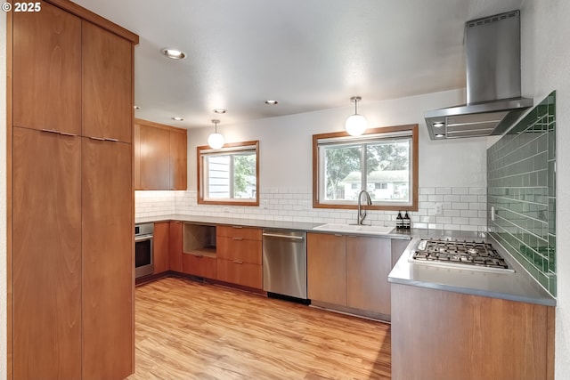 14075 SW Cherryhill Dr, Beaverton, OR 97008 - kitchen featuring a sink, exhaust hood, decorative backsplash, modern cabinets, and appliances with stainless steel finishes