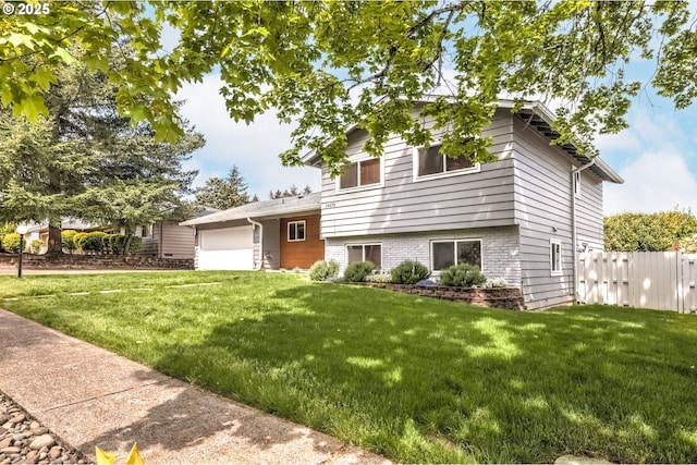 14075 SW Cherryhill Dr, Beaverton, OR 97008 - split level home with a front yard, a garage, and fence