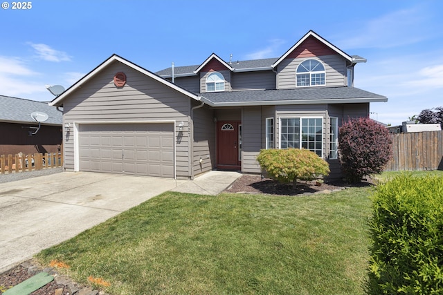 227 Hauser Ct, Molalla, OR 97038 - traditional home with driveway, an attached garage, and a shingled roof