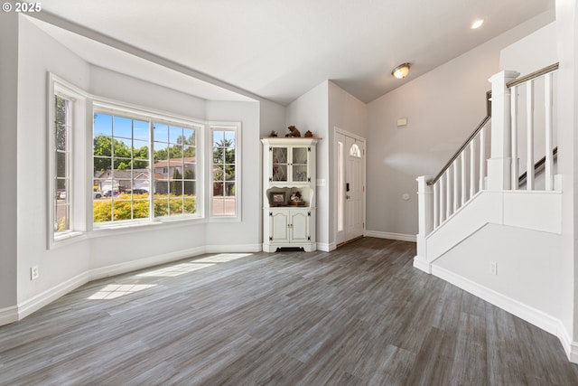 227 Hauser Ct, Molalla, OR 97038 - entryway featuring baseboards, wood finished floors, stairs, vaulted ceiling, and recessed lighting