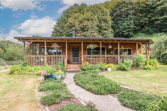 11754 Colvin Rd, Clatskanie, OR 97016 - view of front of home featuring a porch and a front lawn