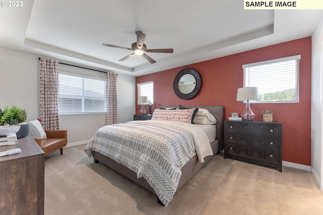 8518 NE 134th Ave Lot 89, Vancouver, WA 98682 - carpeted bedroom with a raised ceiling, baseboards, and ceiling fan