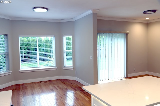 2659 SW Latourell Pl SW, Troutdale, OR 97060 - unfurnished dining area with hardwood / wood-style flooring, baseboards, and ornamental molding