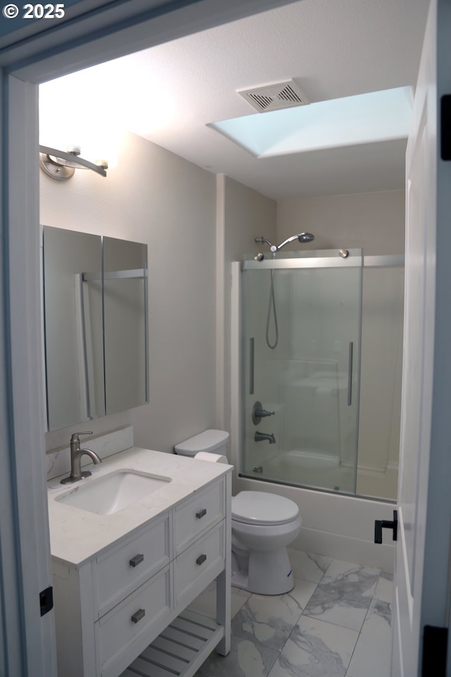 2659 SW Latourell Pl SW, Troutdale, OR 97060 - bathroom with vanity, toilet, bath / shower combo with glass door, and marble look tiles