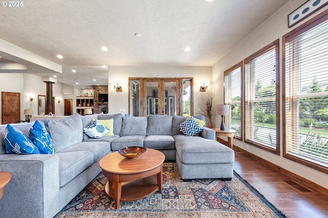 1025 Echo Dr, Roseburg, OR 97470 - living room with wood finished floors, recessed lighting, and a textured ceiling