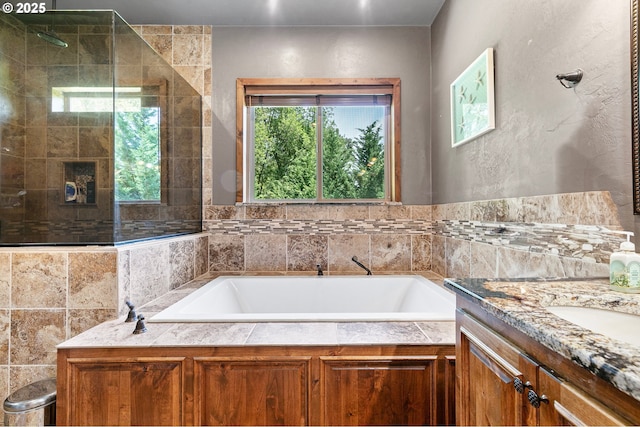 1025 Echo Dr, Roseburg, OR 97470 - full bath featuring a garden tub, vanity, and tiled shower