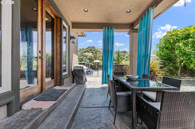 1025 Echo Dr, Roseburg, OR 97470 - view of patio featuring french doors, outdoor dining space, and area for grilling