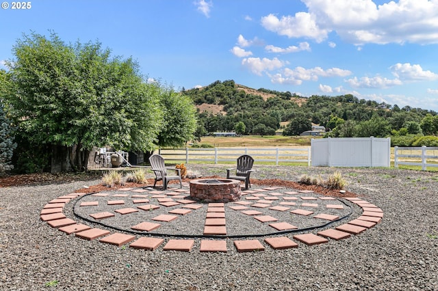 1025 Echo Dr, Roseburg, OR 97470 - view of patio / terrace with a fire pit and a mountain view
