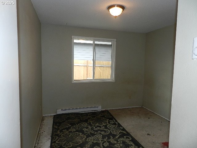 empty room with baseboard heating