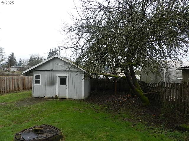 view of outdoor structure featuring a yard