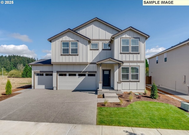 view of front of home with a garage, concrete driveway, and board and batten siding