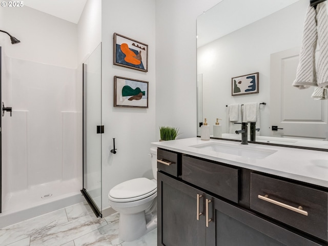 full bathroom with marble finish floor, a stall shower, vanity, and toilet