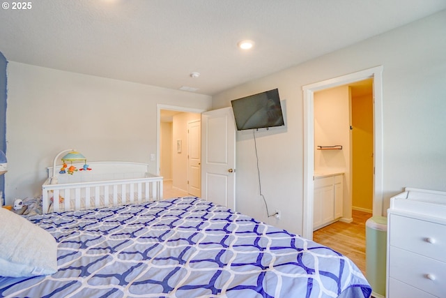 2804 N 3rd Way, Ridgefield, WA 98642 - bedroom featuring wood finished floors, ensuite bathroom, and recessed lighting