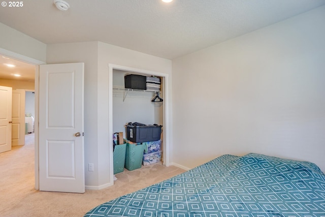 2804 N 3rd Way, Ridgefield, WA 98642 - bedroom with carpet, baseboards, a closet, recessed lighting, and washer / dryer