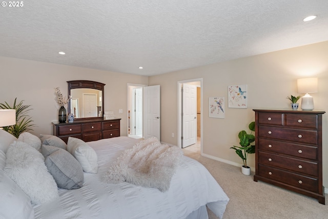 14230 Amberwood Cir, Lake Oswego, OR 97035 - bedroom featuring light carpet, baseboards, recessed lighting, and a textured ceiling