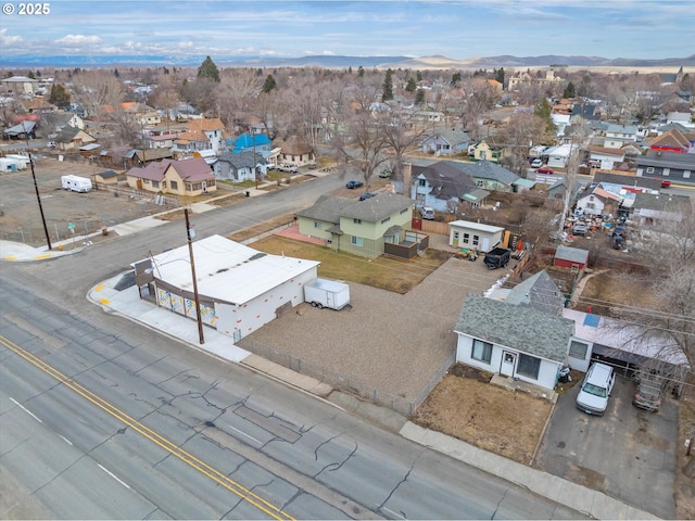 birds eye view of property featuring a residential view and a mountain view