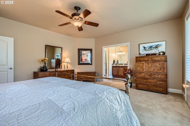 1114 S 6th Way, Ridgefield, WA 98642 - carpeted bedroom with ceiling fan, baseboards, and ensuite bathroom