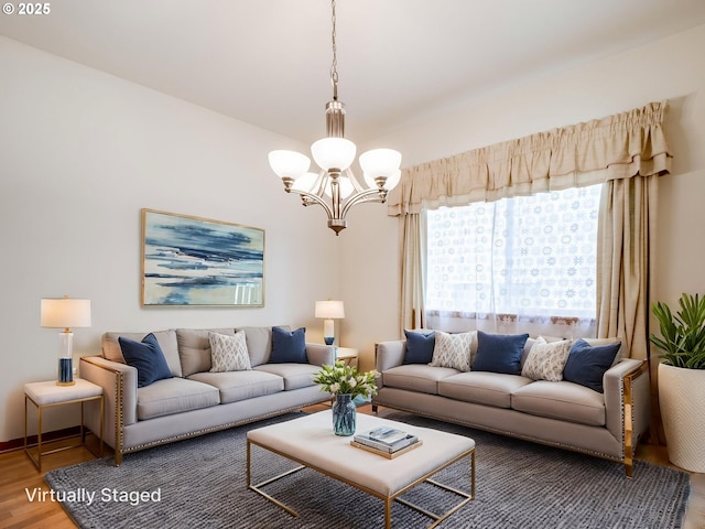 15460 SW 145th Ter, Portland, OR 97224 - living room with a chandelier and wood finished floors