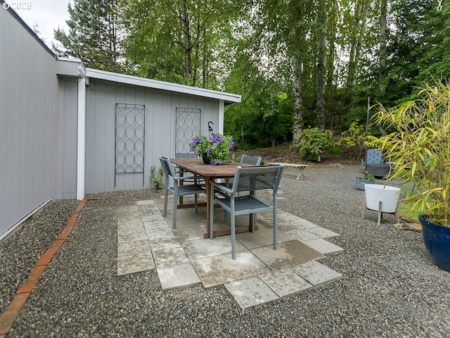 1339 NW 7th Ave, Camas, WA 98607 - view of patio / terrace featuring outdoor dining space and view of wooded area