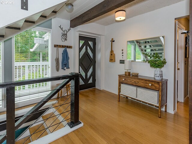 1339 NW 7th Ave, Camas, WA 98607 - foyer entrance with light wood-style flooring, baseboards, and beam ceiling