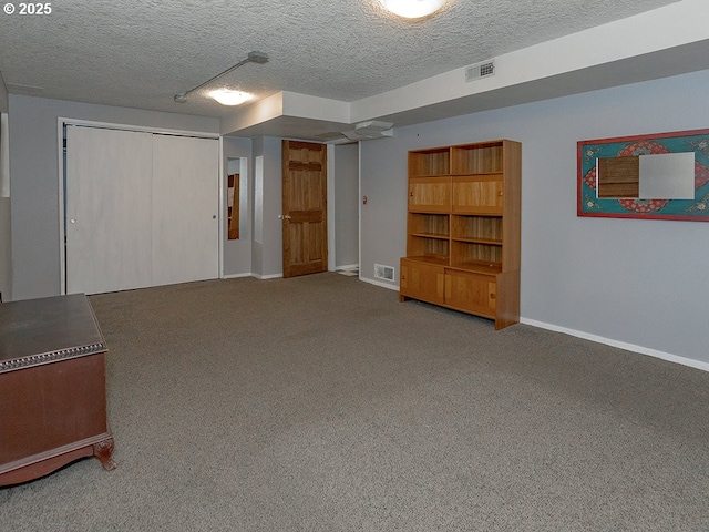 1339 NW 7th Ave, Camas, WA 98607 - finished basement with baseboards, carpet floors, and a textured ceiling